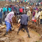 At least 13 killed, many more feared dead as landslides bury Uganda homes